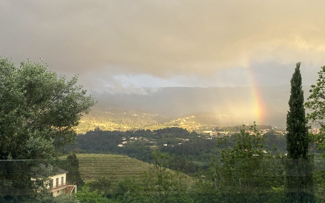 View over the Portuguese countryside with rainbow after rain, reflecting on trends in the short-term rental market